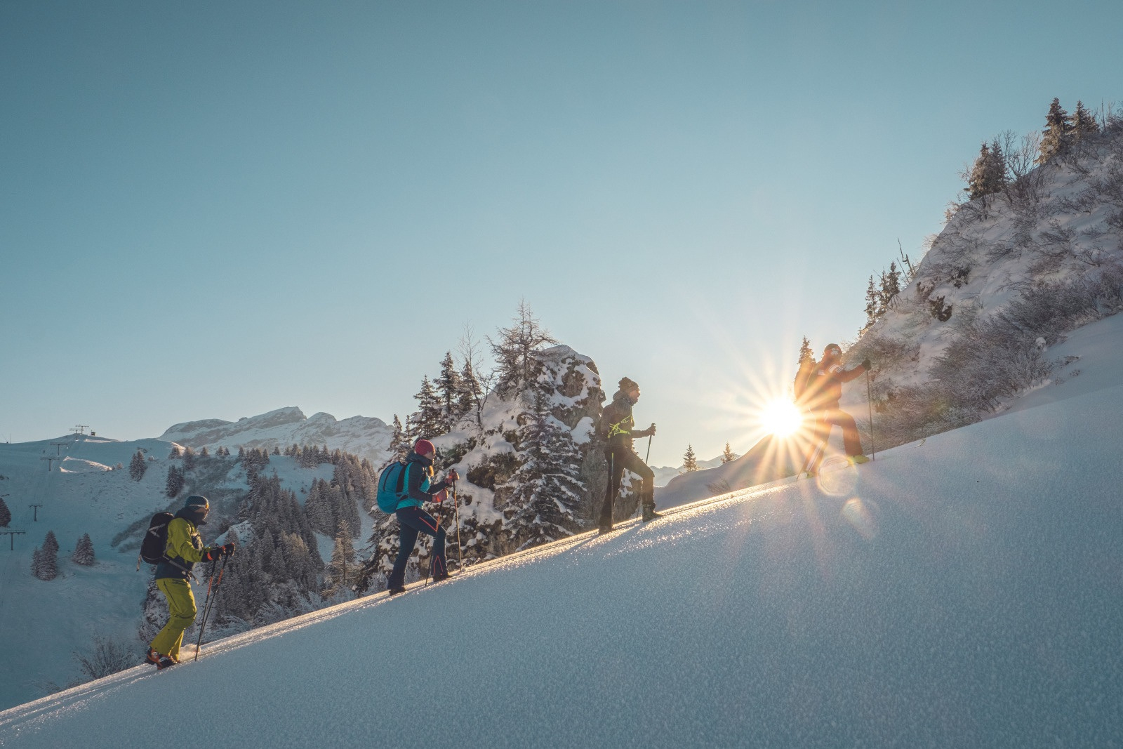Climbing on a ski tour on a beautiful winter day.