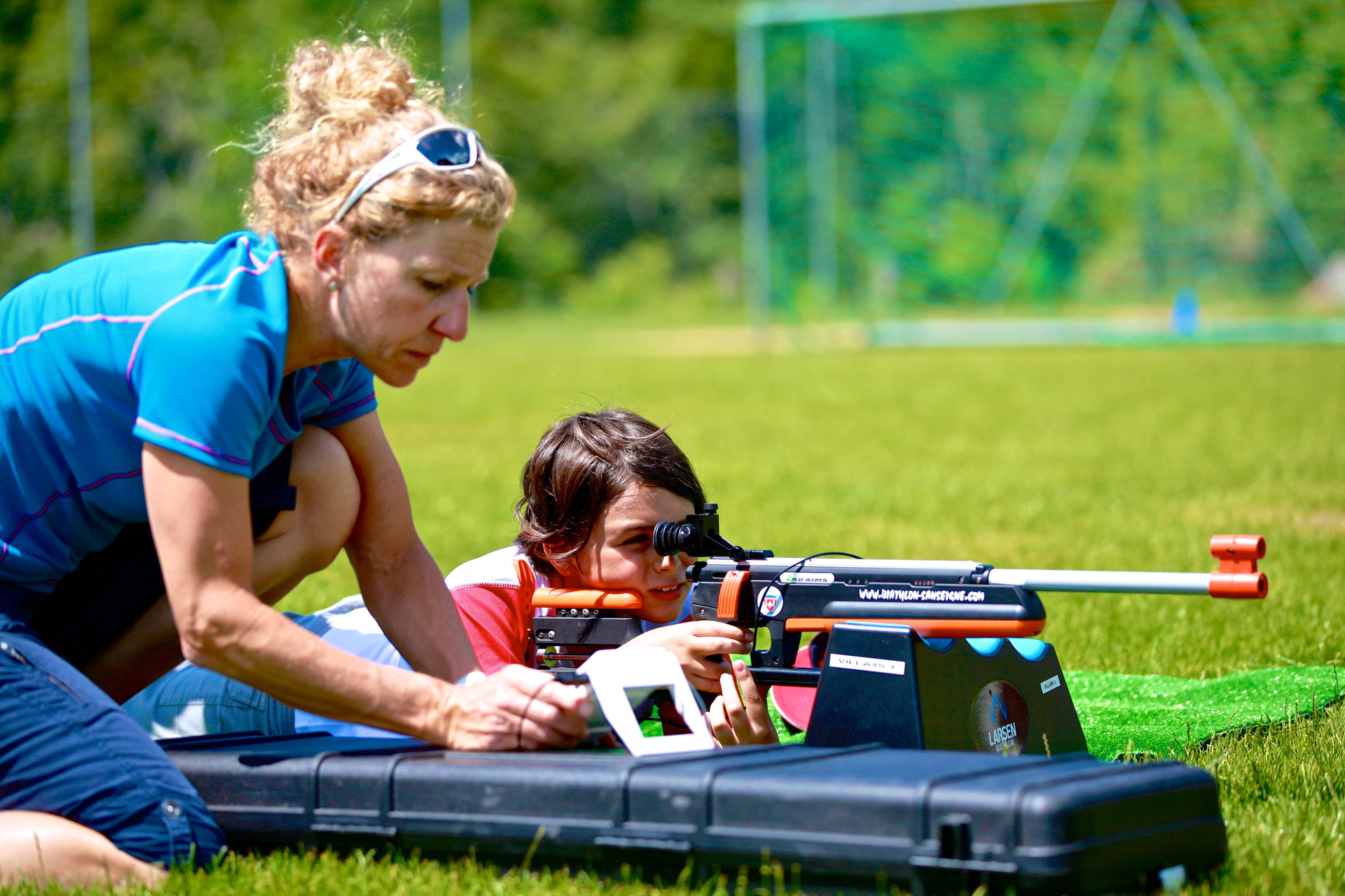 Laser rifle shooting during an introduction to biathlon in summer offered by the Villars Swiss Ski School