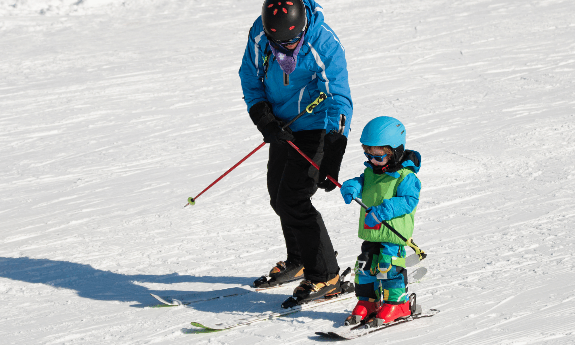 Apprentissage ski enfant et papa - Hiver - Pays-d'Enhaut - Canva