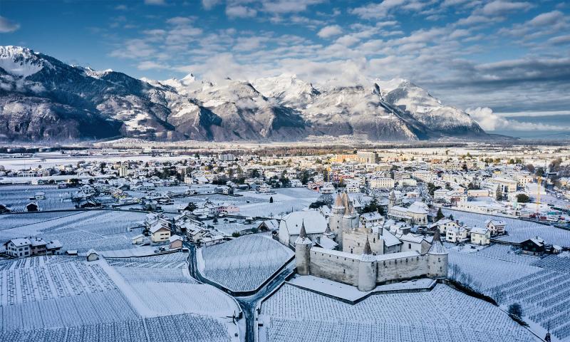 View over Aigle and the snow-covered castle