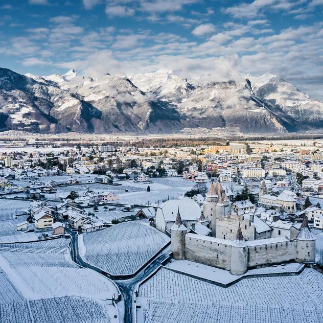 View over Aigle and the snow-covered castle