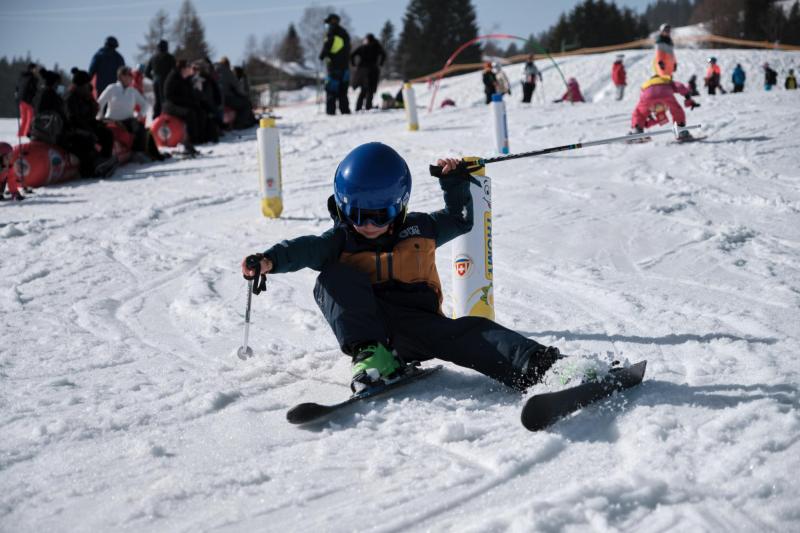 Les Mosses - Child slaloming on skis in Les Mosses Park - Winter