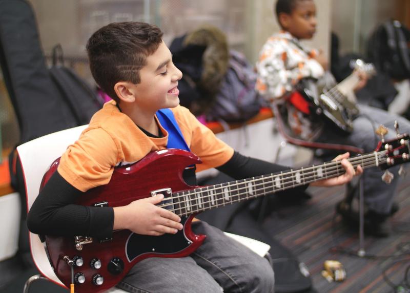 child guitar player