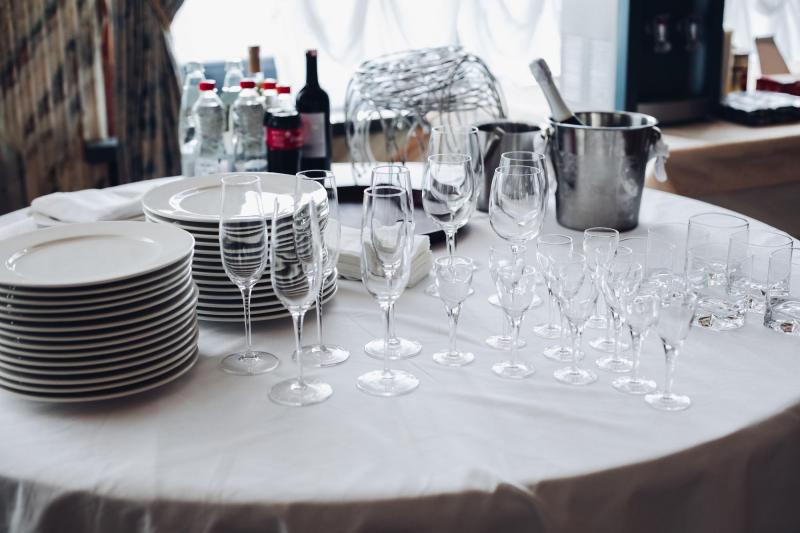 Table with plates and wine glasses