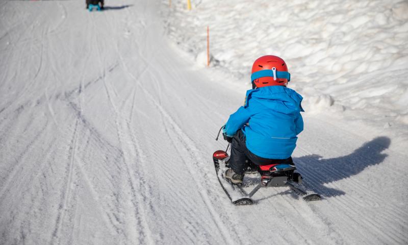 Schlittenfahren Kind-Freizeit-Hiver-Olivier Fatzer