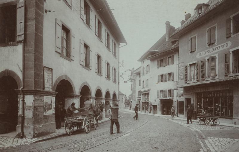 Avenue de la Gare de Bex und Fassade des Rathauses im Jahr 1903