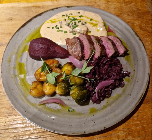 Roasted saddle of venison with morel sauce